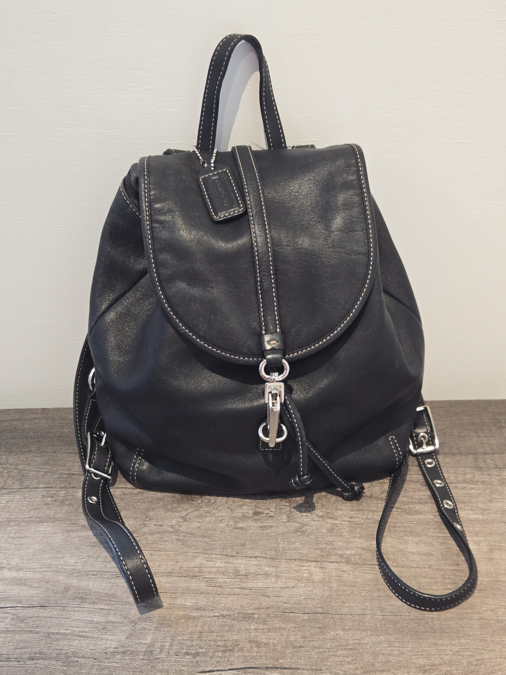 Black Leather Drawstring Backpack with Silver Hardware
